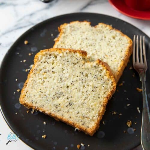 Feature image for Lemon Poppy Seed Loaf, showing two slices served with coffee.
