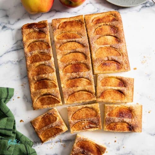 Feature image for Apple sheet cake, showing some slices that are ready for serving.