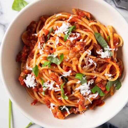 Latest featured image for Pancetta pasta with tomatoes, showing a serving of the dish.