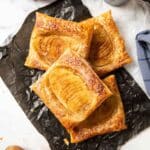 Latest feature image for pear tarts using puff pastry, sprinkled with sugar.