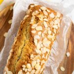 Freshly baked banana bread with almonds, ready for serving.