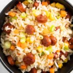 A closer shot of kielbasa fried rice, highlighting the texture of the rice and kielbasa.