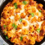 Easy baked gnocchi fresh out of the oven, highlighting its golden colour.