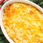 A closer shot of potato and zucchini casserole, highlighting its golden colour.