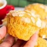 A closer shot of a carrot and almond muffin, higlighting its texture.