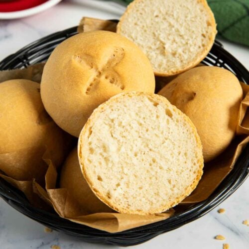A closer shot of the inside of buns with yogurt, highlighting its texture.