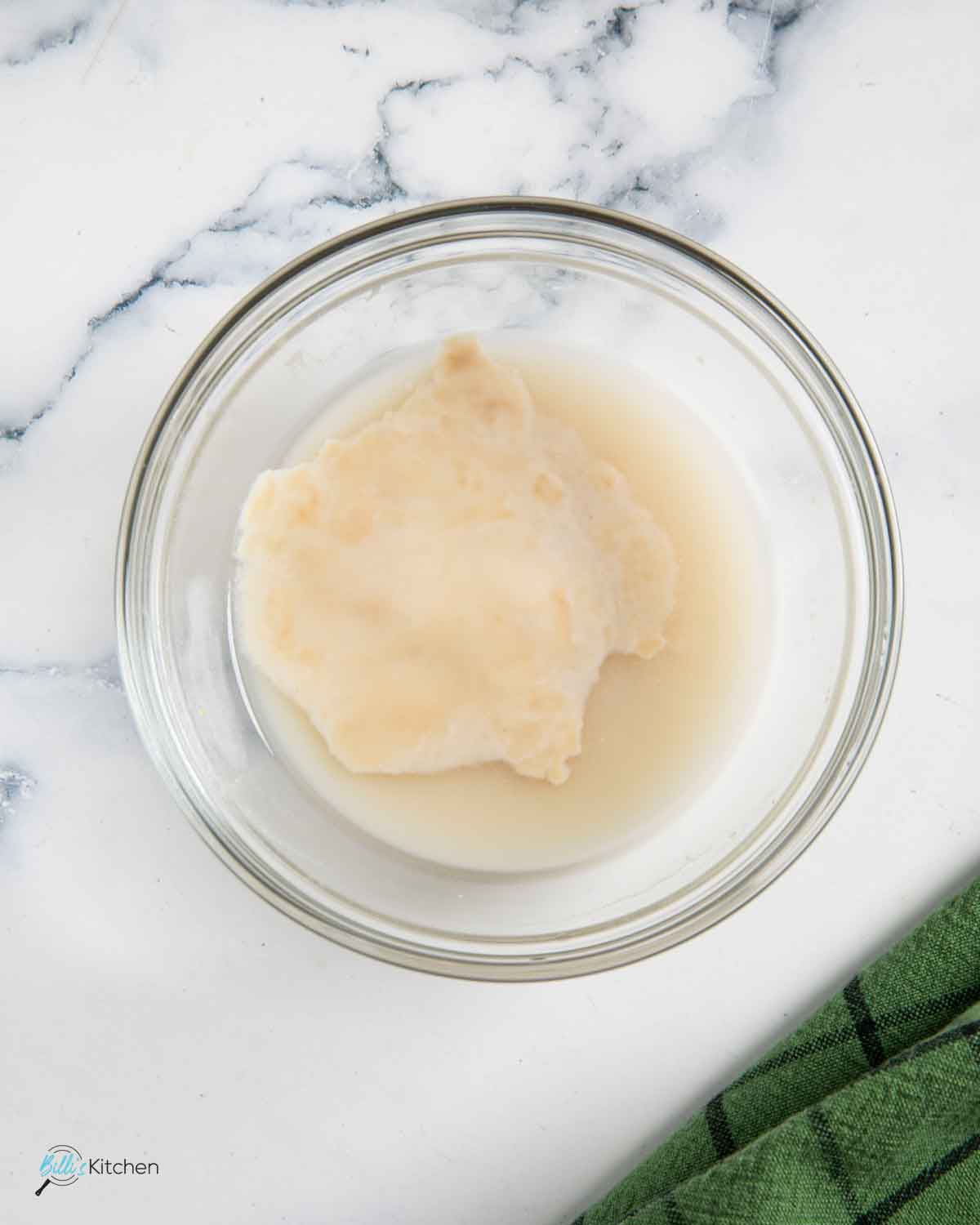 Preparing the yeast is the first step in making buns with yogurt at home.