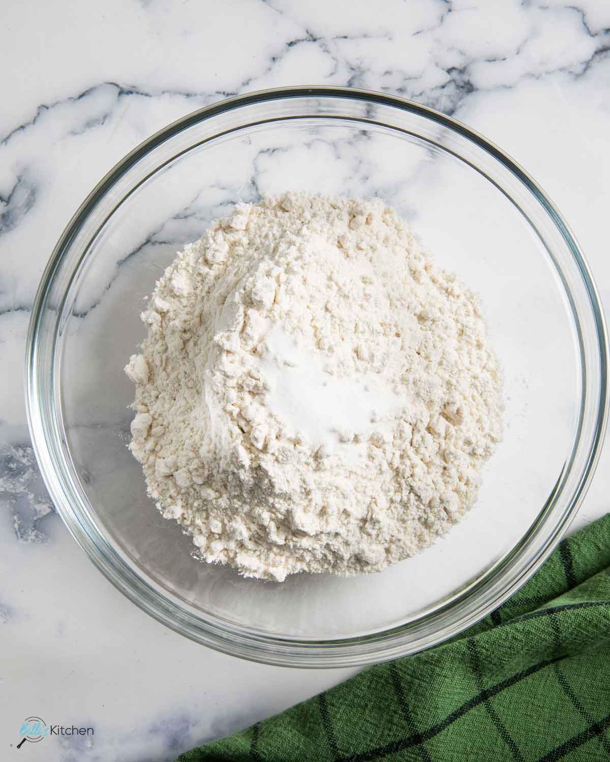 The flour and the salt are combined before adding the liquid ingredients.